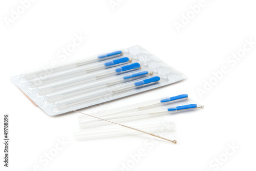 Acupuncture needles on isolate photo