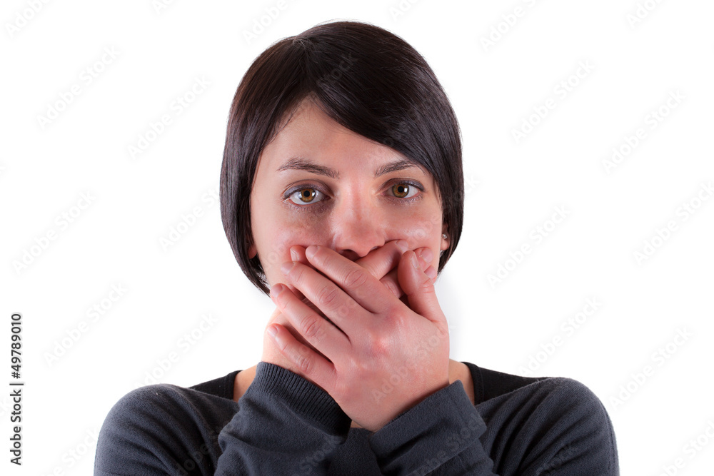 bright closeup picture of woman with hand over mouth bright closeup picture of woman with hand over mouth
