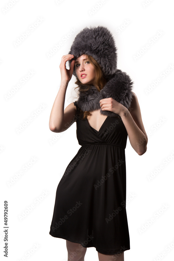 woman wearing an elegant black dress and winter fur hat woman wearing an elegant black dress and winter fur hat
