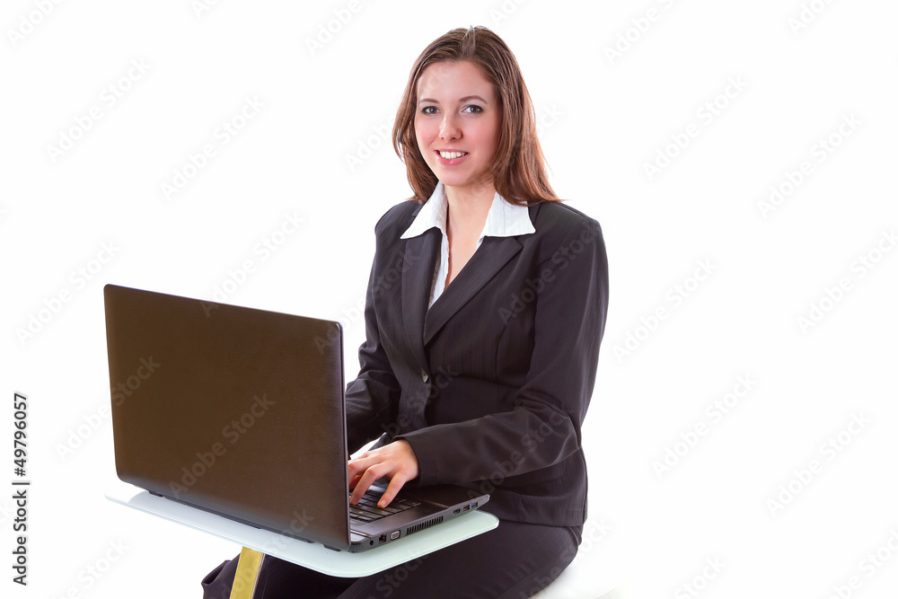 Business woman working on the laptop over white background Business woman working on the laptop over white background
