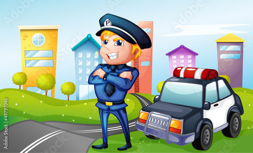 A smiling policeman at the road