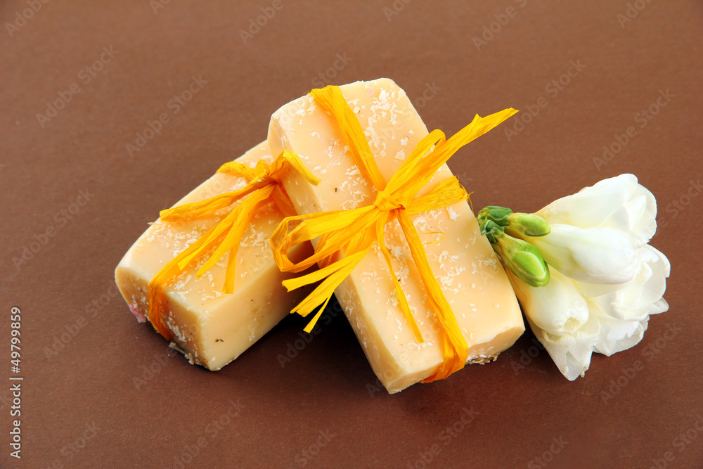 Natural handmade soap, on brown background Natural handmade soap, on brown background