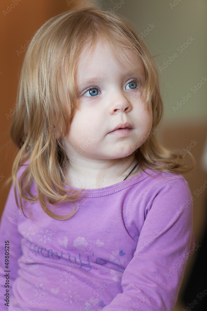 Picture of pensive small girl with blue eyes and blond hair Picture of pensive small girl with blue eyes and blond hair