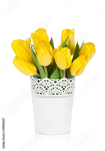 Fototapeta Naklejka Na Ścianę i Meble -  Yellow tulips in a vase