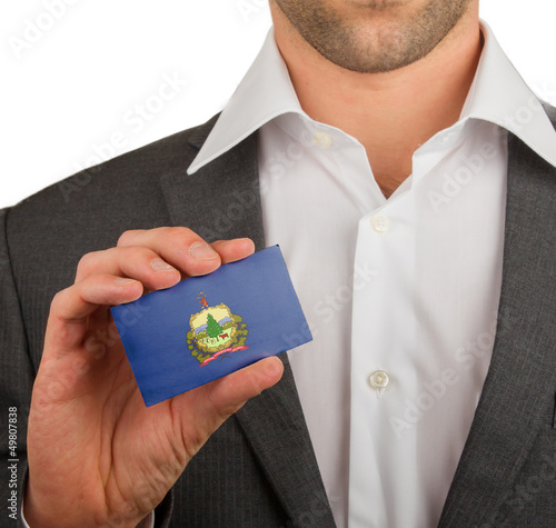 Businessman is holding a business card, Vermont photo