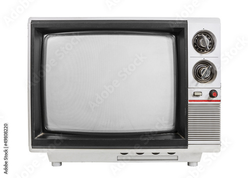 Grungy vintage portable television isolated with turned off scre