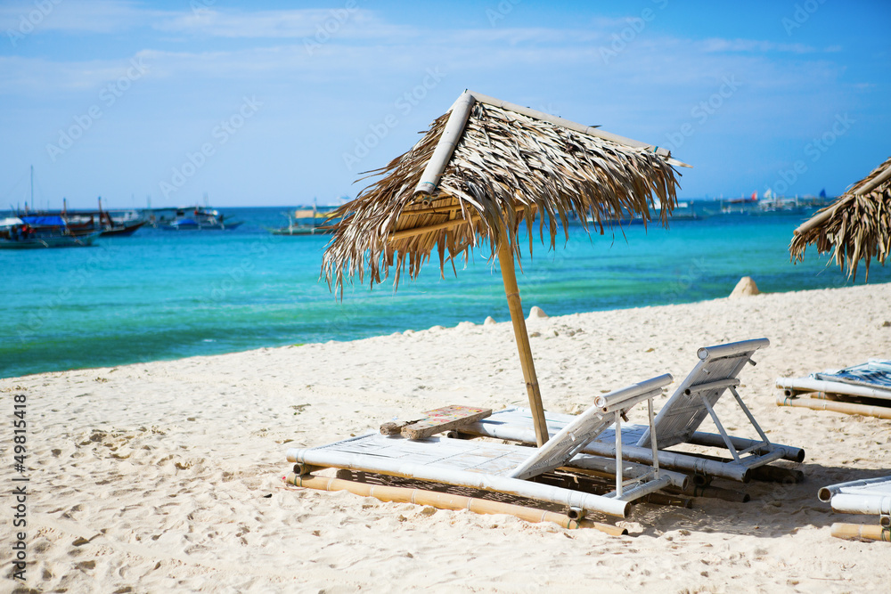 Deckchairs at the perfect sand beach on Boracay, Philippines Deckchairs at the perfect sand beach on Boracay, Philippines