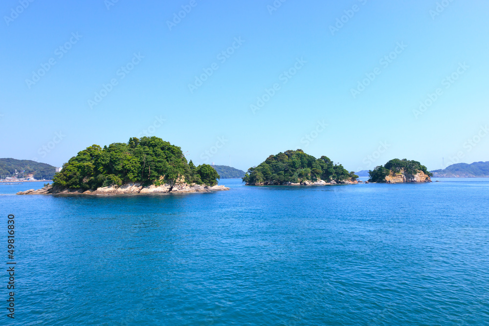 Small islands on sea and blue sky. Toba bay, Japan.
