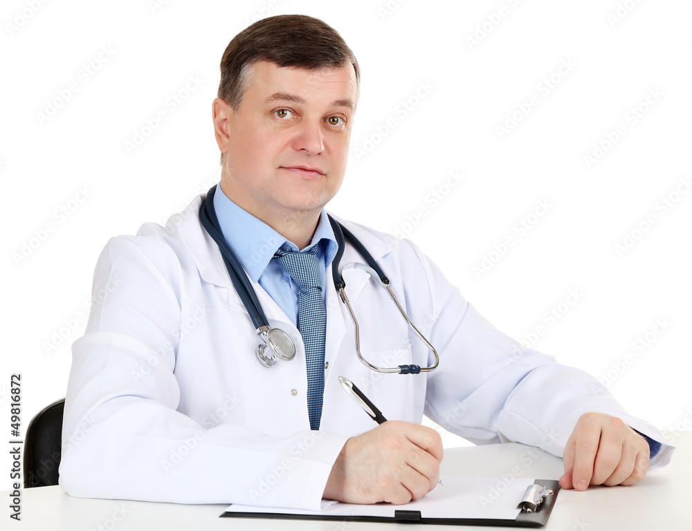 Medical doctor working at desk isolated on white Medical doctor working at desk isolated on white