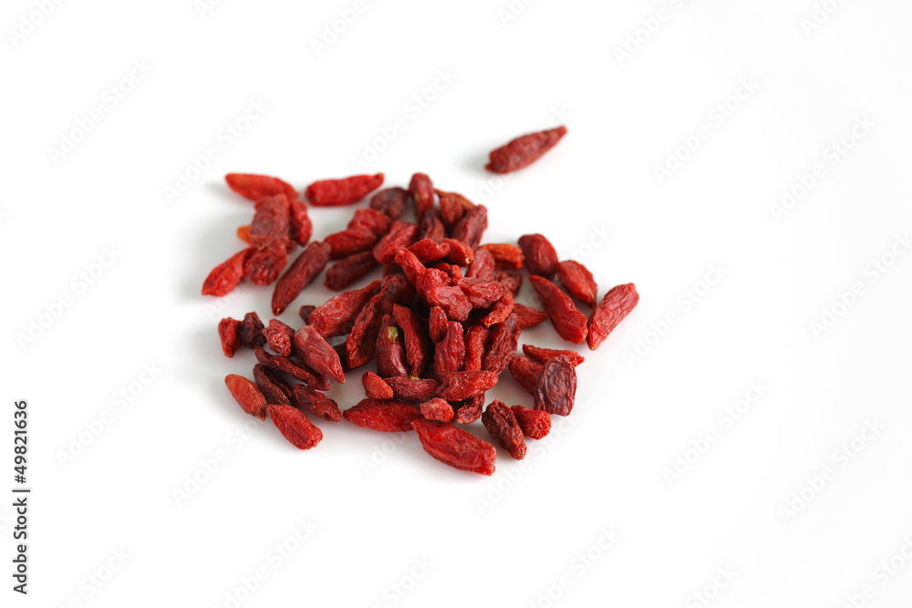 Dried Goji berries or cranberries fruit isolated on white Dried Goji berries or cranberries fruit isolated on white