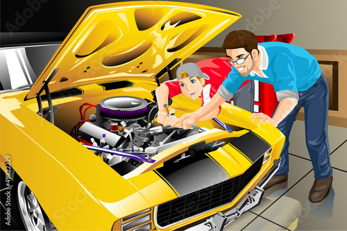 Father and son with their car