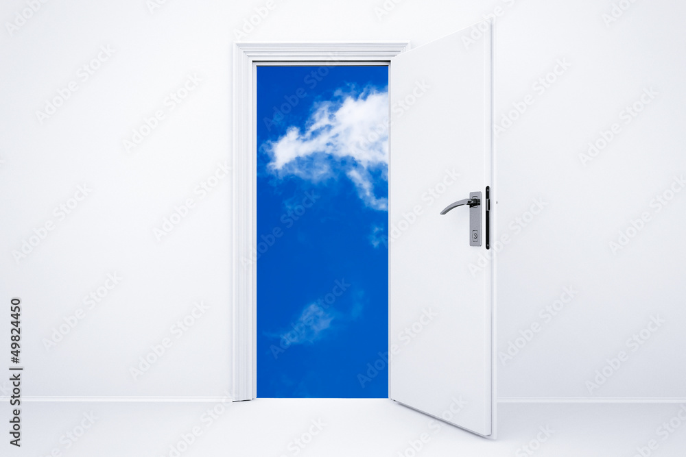 Opened white door with cloudy sky Opened white door with cloudy sky