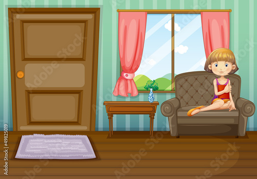 A woman sitting inside the house