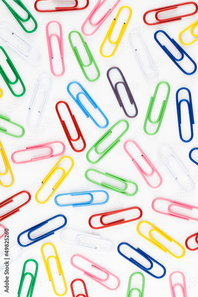 colorful paper clips in white background colorful paper clips in white background