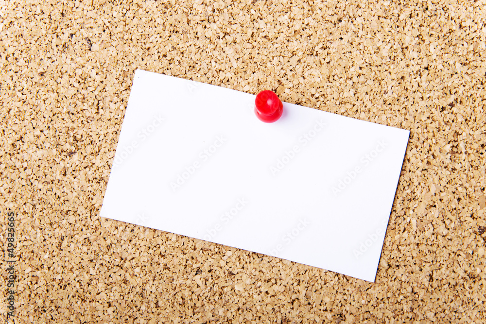 Note paper on cork board Note paper on cork board