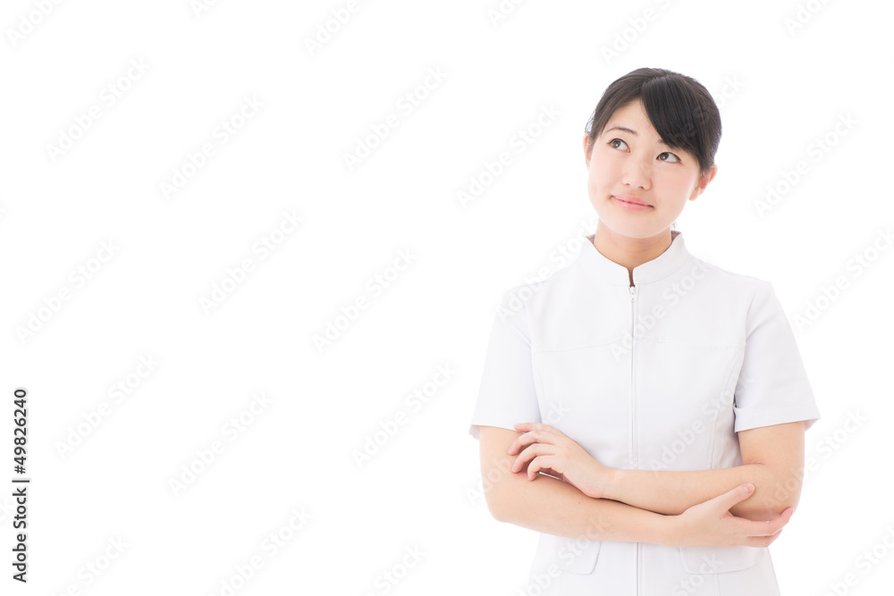 a young asian nurse thinking on white background a young asian nurse thinking on white background