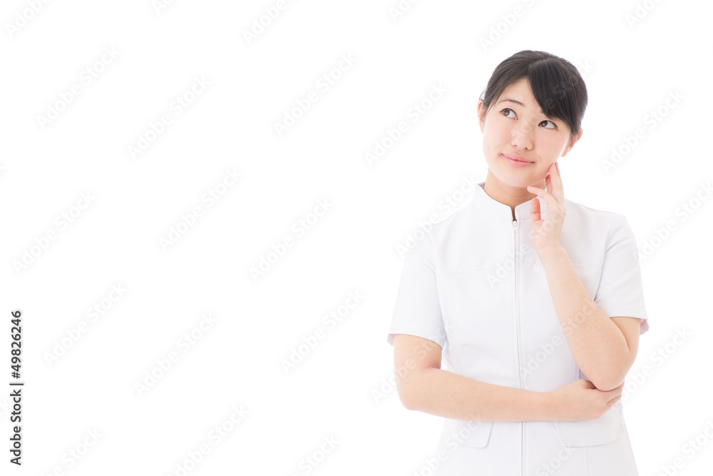 a young asian nurse thinking on white background a young asian nurse thinking on white background