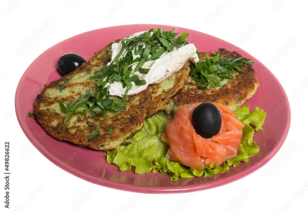 Roasted cutlets of potato with salmon on a plate Roasted cutlets of potato with salmon on a plate