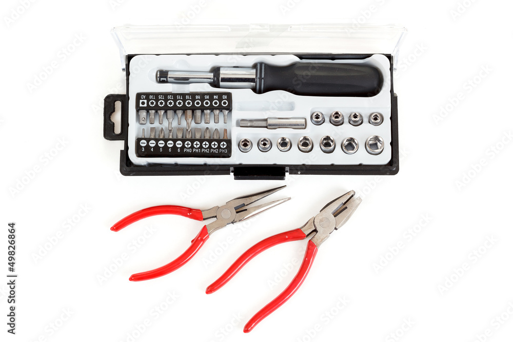 Screwdriver Bit Set with pliers on white Screwdriver Bit Set with pliers on white