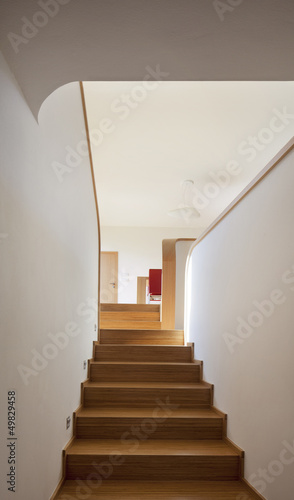 modern new wooden staircase in the house