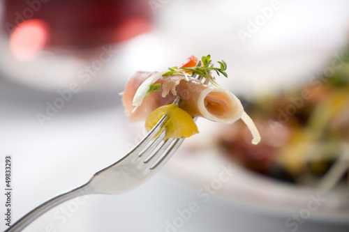 Schilderij op canvas delicious prosciutto titbit on a fork