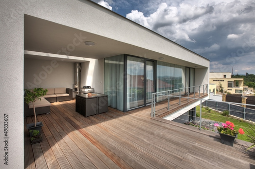 Fototapeta timber pool deck on modern home terrace