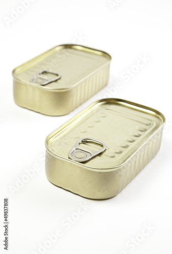 Unopened cans of sardines