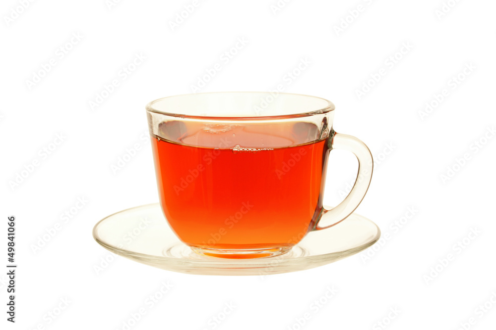tea in glass cup on saucer isolated on white tea in glass cup on saucer isolated on white