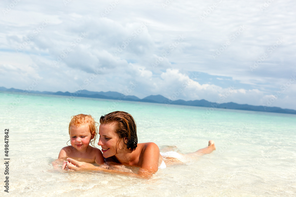 Mother with little daughter on the beach Mother with little daughter on the beach