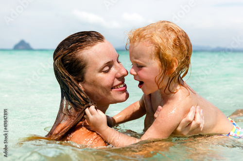 Mother with little daughter on the beach © Dmytro Panchenko