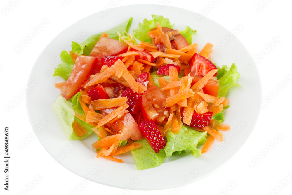 salad with strawberry on the plate on white background salad with strawberry on the plate on white background