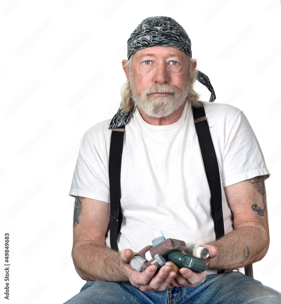 Strong man with a handful of breathing medications Strong man with a handful of breathing medications