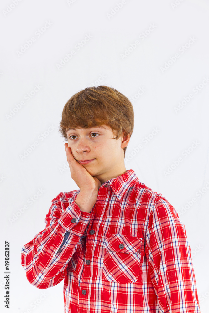 attractive thinking boy in studio attractive thinking boy in studio