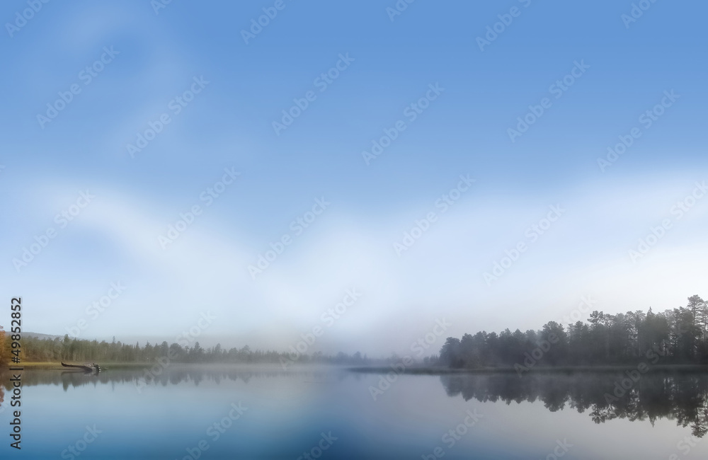 Morning soft fog on a lake