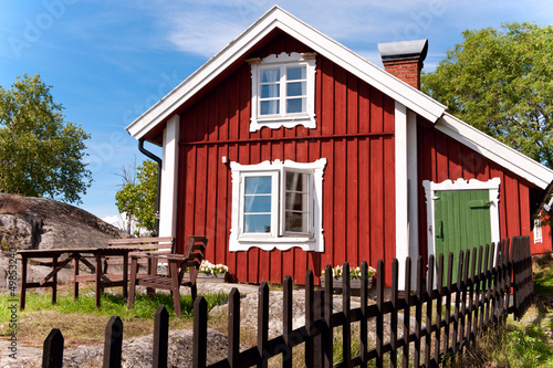 Red summer scandinavian house.