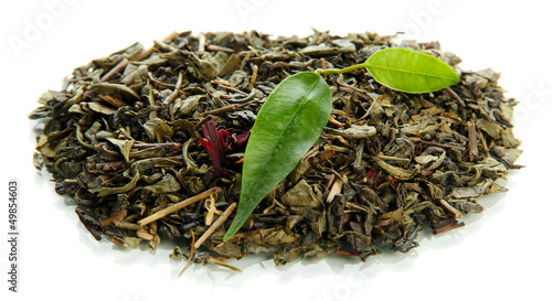 Dry tea with green leaves, isolated on white