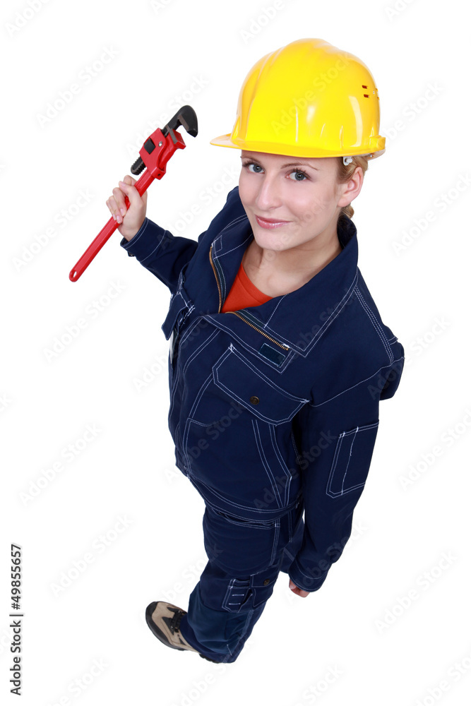 Female worker with a wrench Female worker with a wrench