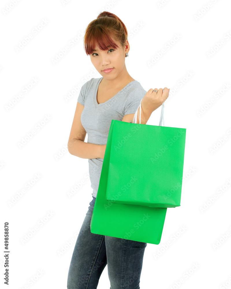 Isolated Young Asian woman with Green Shopping Bags Isolated Young Asian woman with Green Shopping Bags