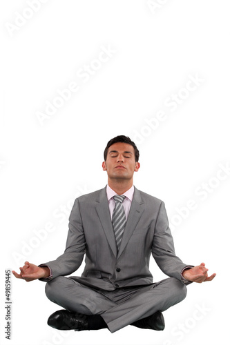 Businessman meditating