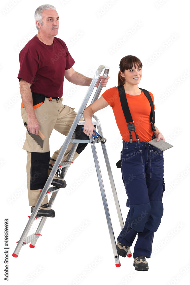 Tiler and female helper Tiler and female helper