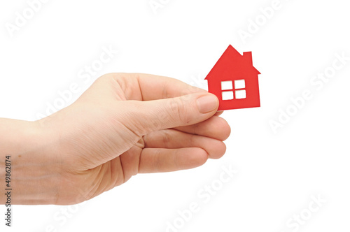 house icon in women's hand
