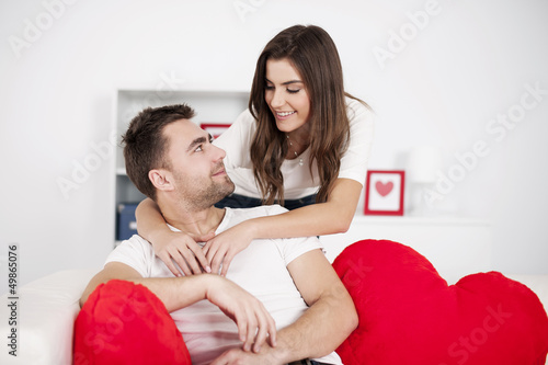 Men being embraced by him girlfriend