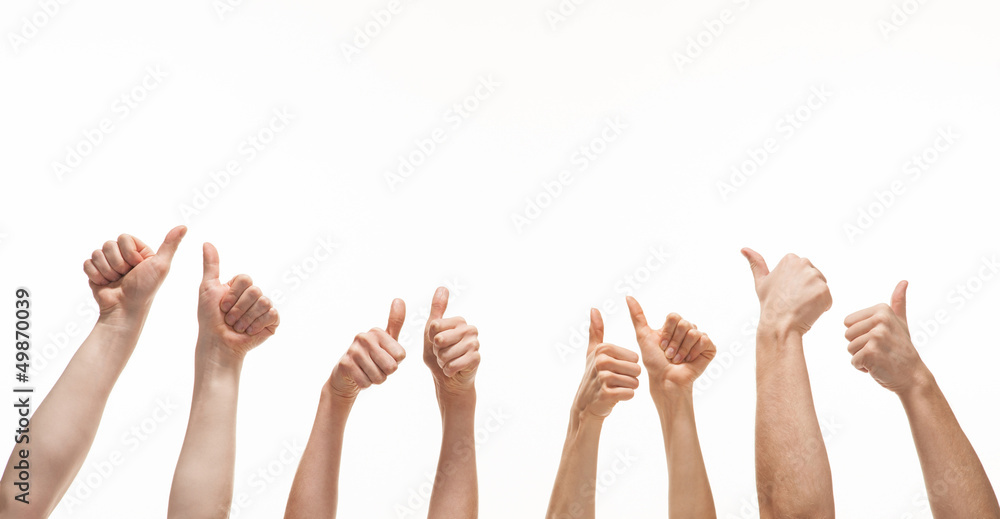 Many hands showing thumb up signs on white background Many hands showing thumb up signs on white background