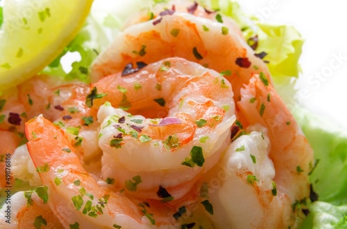 Salad with shrimp sprinkled with parsley sea photo