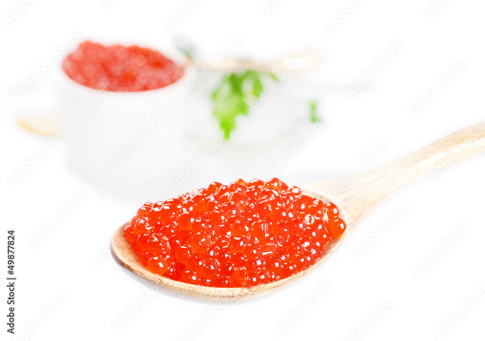 Fresh golden red caviar isolated on white Fresh golden red caviar isolated on white