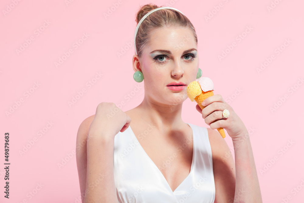 Girl blonde hair fifties fashion style eating ice cream. Girl blonde hair fifties fashion style eating ice cream.