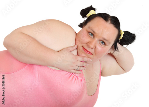 Overweight woman on a white background. photo