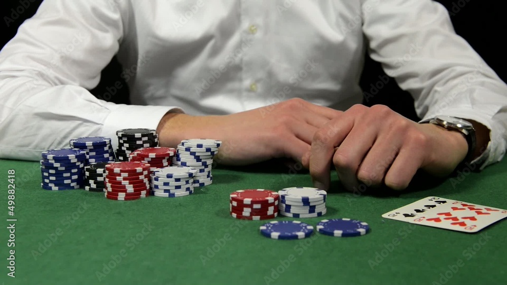 Poker player showing his hand Poker player showing his hand