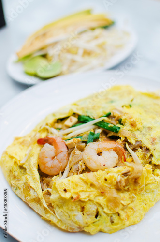 Fried noodle wrapped with eggs, Thai style food
