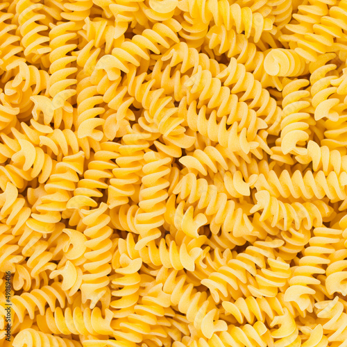 Italian Fusilli, Rotini or Scroodle Macaroni Pasta background